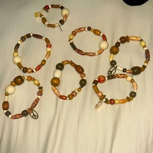 Multicolor (neutral and red tones) Bead peace bracelets
